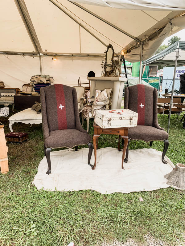 Chairs upholstered in vintage swiss cross blanket 