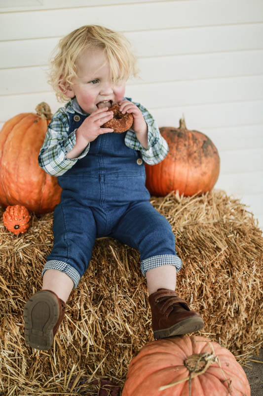 Zara Overalls Toddler playing at Post Family Farm. Fun Fall Activities for the Kids 