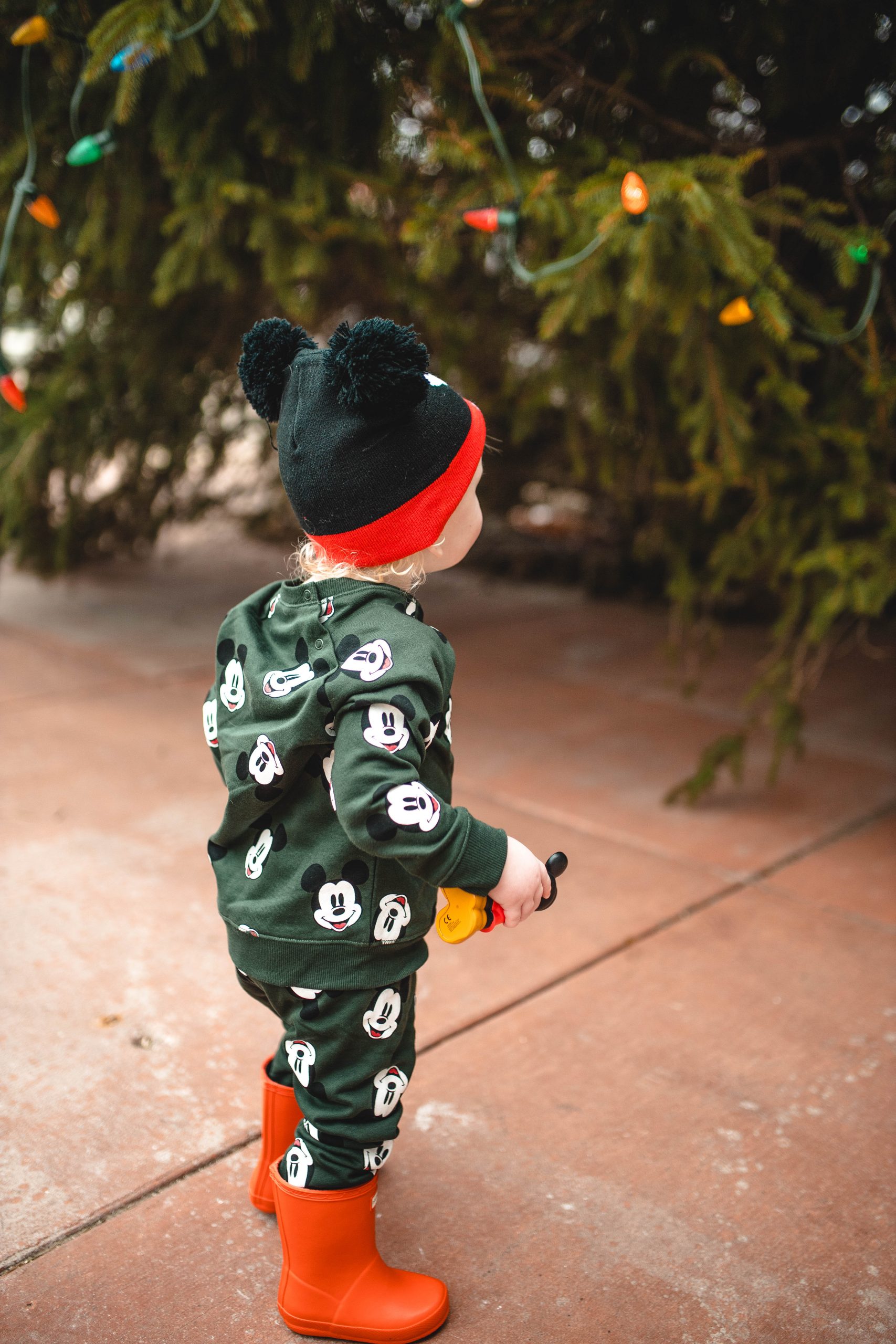 Mickey Mouse H & M Outfit with a giant christmas tree 