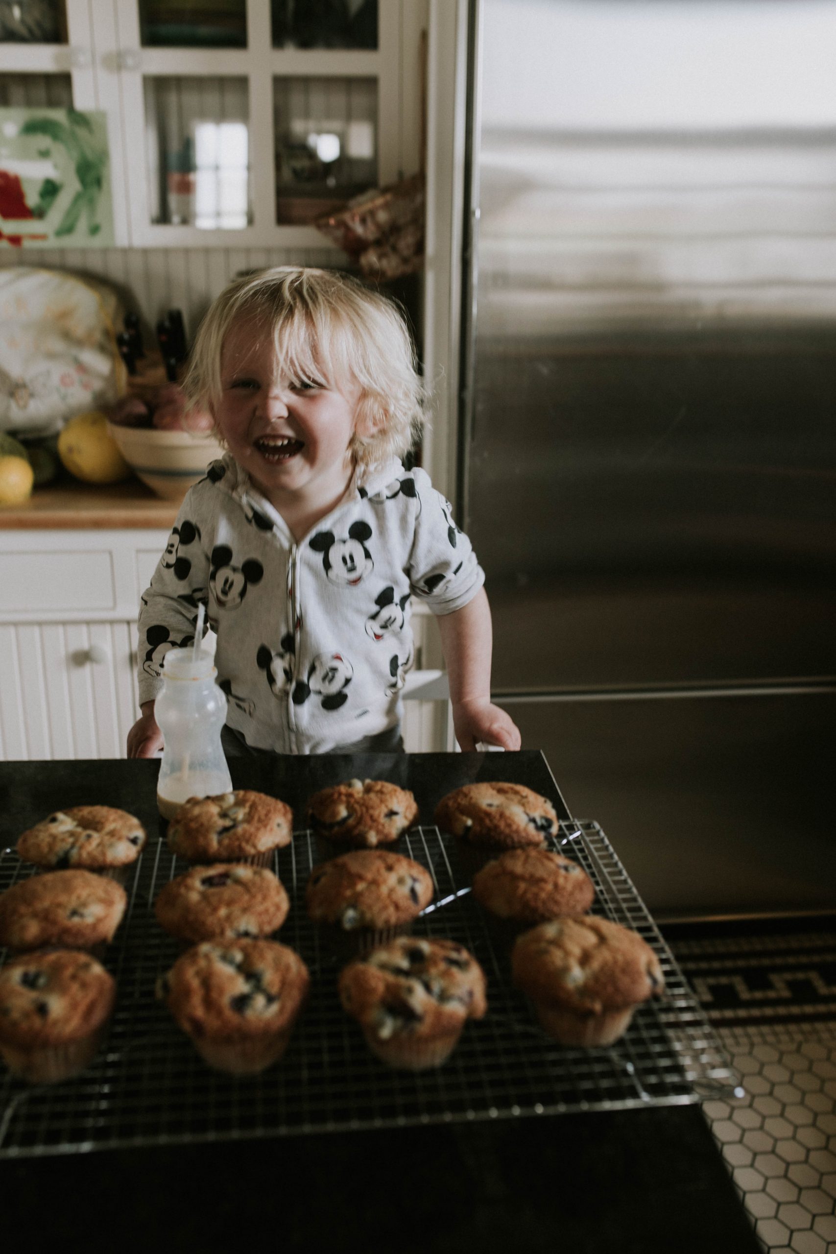 toddler baking muffins 