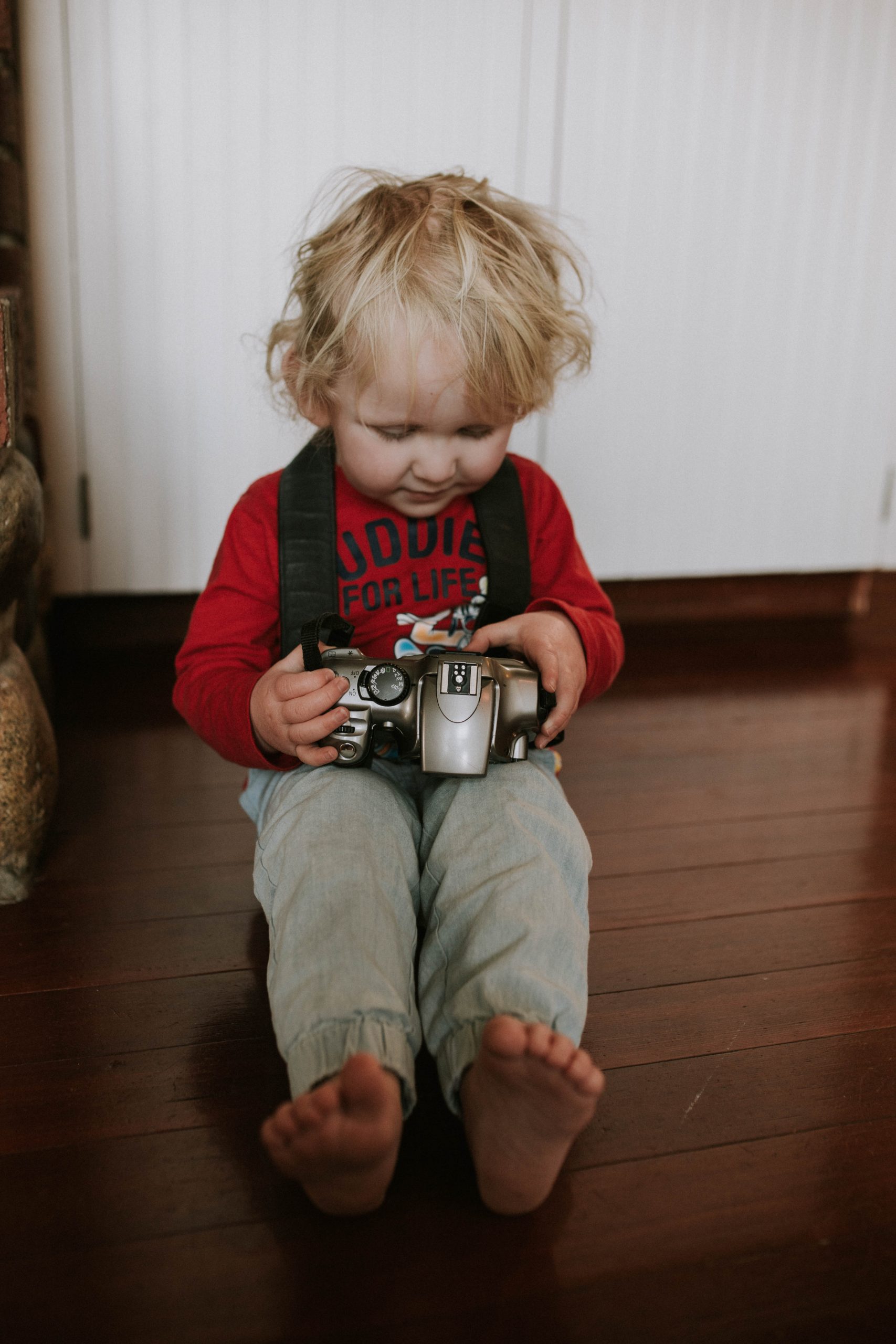 My son loves my old cannon camera to play photographer with